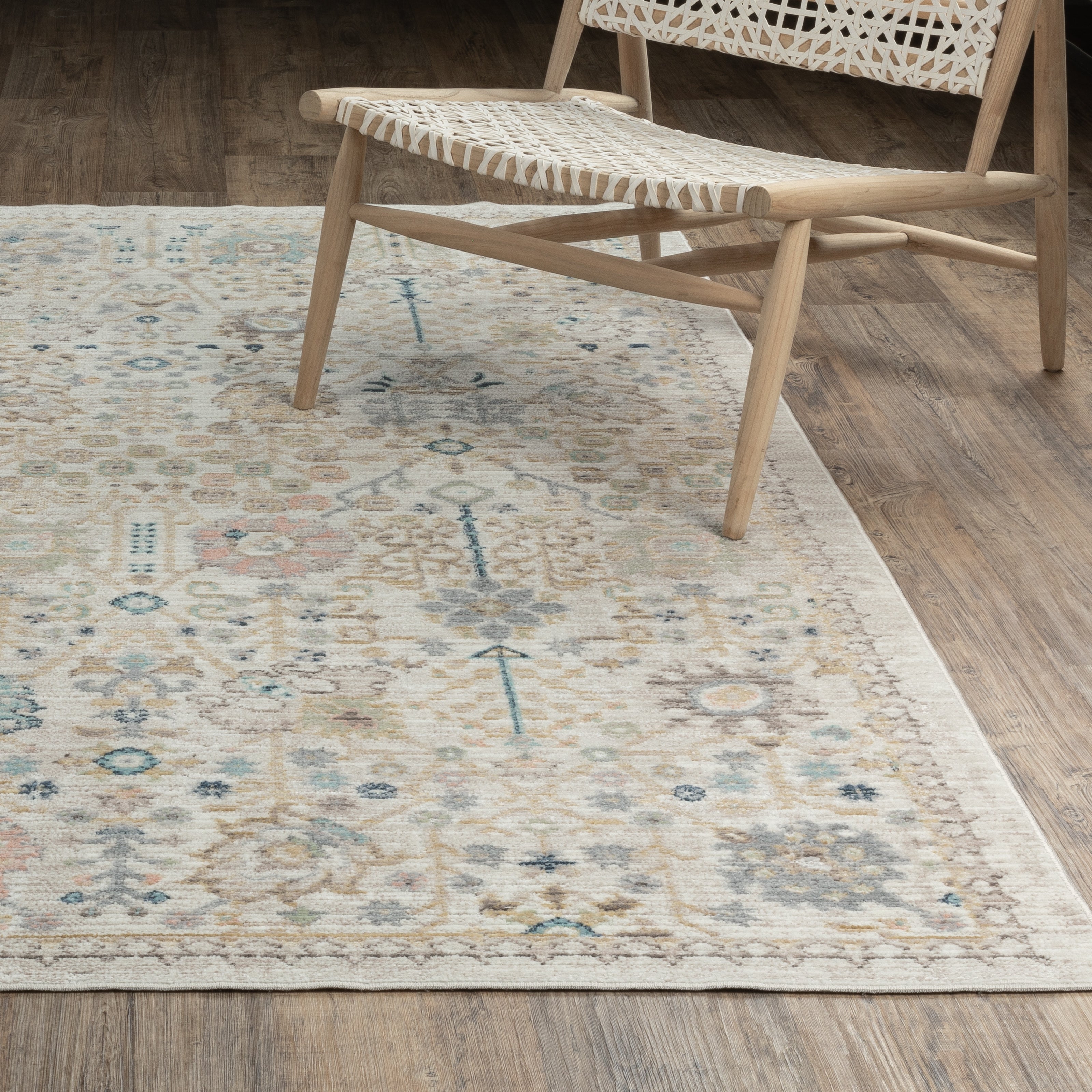 Oriental Weavers Cavett CAV13 soft transitional rug featuring decorative pattern in blue/ pink tones