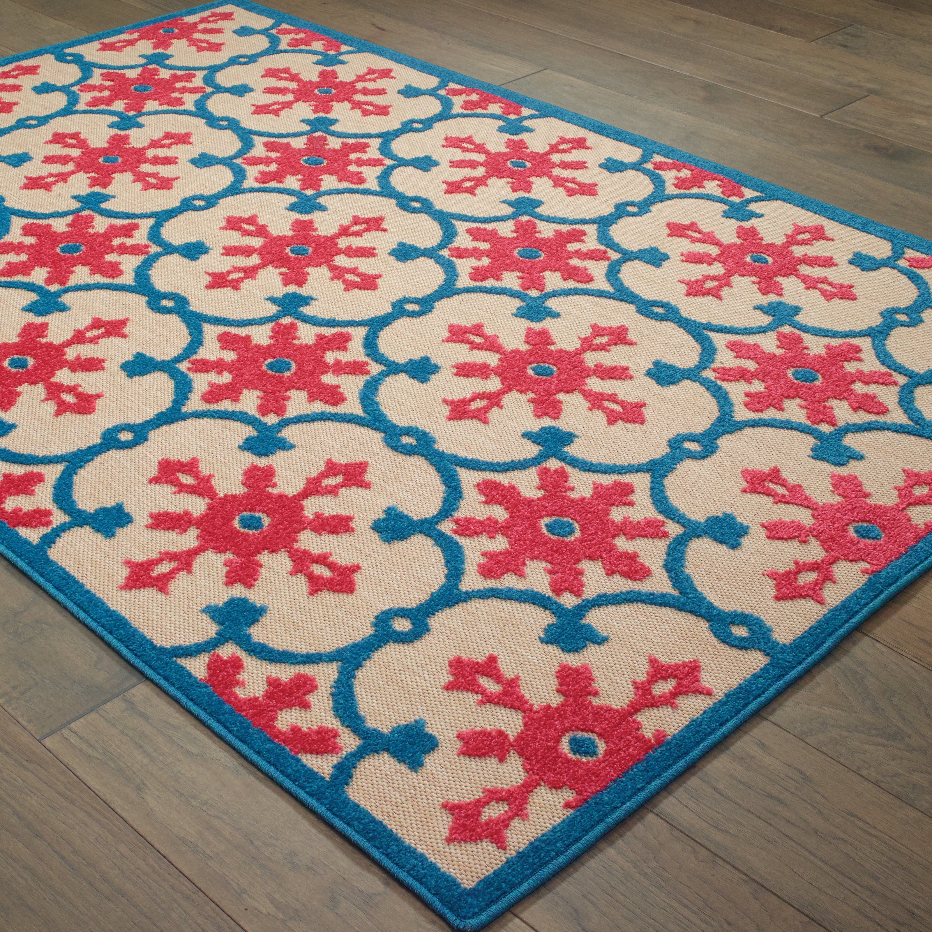 Oriental Weavers Cayman 190L9 textured indoor-outdoor rug featuring abstract pattern in pink/ blue tones