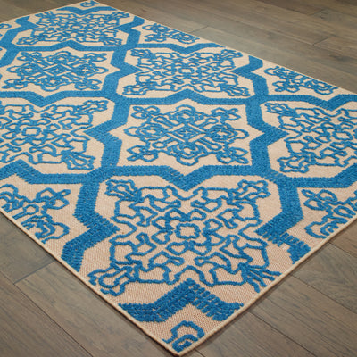 Oriental Weavers Cayman 2541M textured indoor-outdoor rug featuring abstract pattern in sand/ blue tones