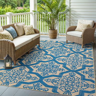 Oriental Weavers Cayman 2541M textured indoor-outdoor rug featuring abstract pattern in sand/ blue tones