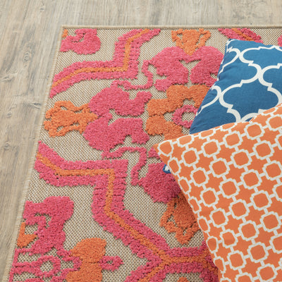 Oriental Weavers Cayman 2541V textured indoor-outdoor rug featuring abstract pattern in sand/ pink tones