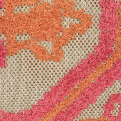 Oriental Weavers Cayman 2541V textured indoor-outdoor rug featuring abstract pattern in sand/ pink tones