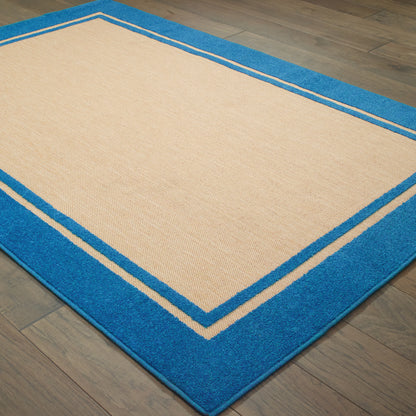 Oriental Weavers Cayman 5594B textured indoor-outdoor rug featuring abstract pattern in sand/ blue tones