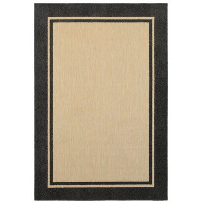 Oriental Weavers Cayman 5594K textured indoor-outdoor rug featuring abstract pattern in sand/ charcoal tones