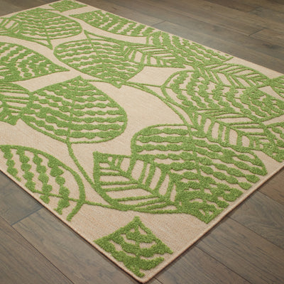 Oriental Weavers Cayman 566F9 textured indoor-outdoor rug featuring abstract pattern in sand/ green tones