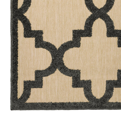 Oriental Weavers Cayman 660N9 textured indoor-outdoor rug featuring abstract pattern in sand/ charcoal tones