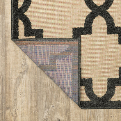Oriental Weavers Cayman 660N9 textured indoor-outdoor rug featuring abstract pattern in sand/ charcoal tones