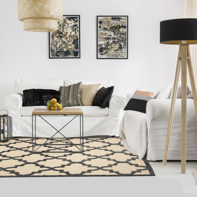 Oriental Weavers Cayman 660N9 textured indoor-outdoor rug featuring abstract pattern in sand/ charcoal tones