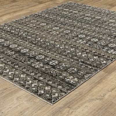 Oriental Weavers Chamberlain CH07C plush traditional rug featuring decorative pattern in black/ grey tones