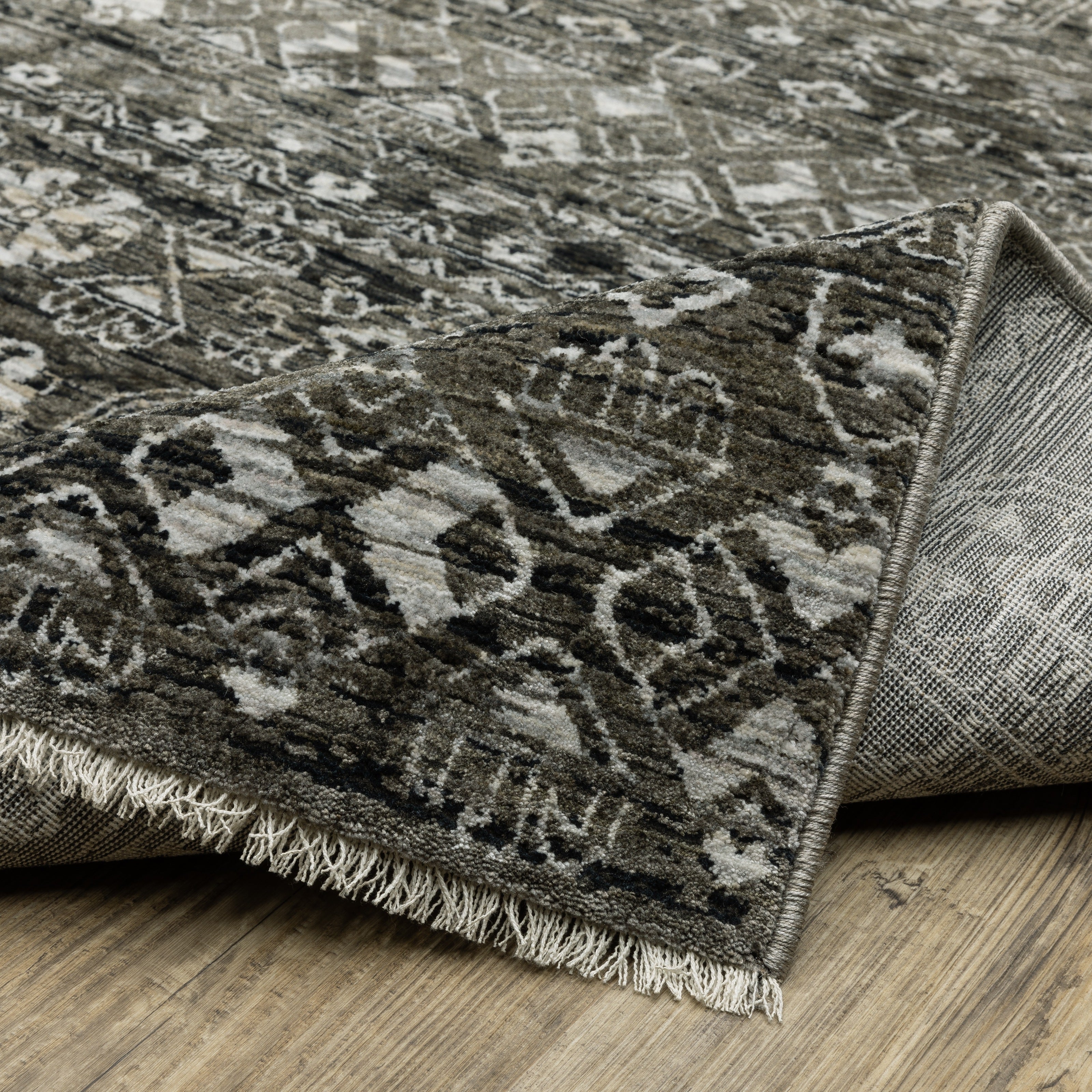 Oriental Weavers Chamberlain CH07C plush traditional rug featuring decorative pattern in black/ grey tones