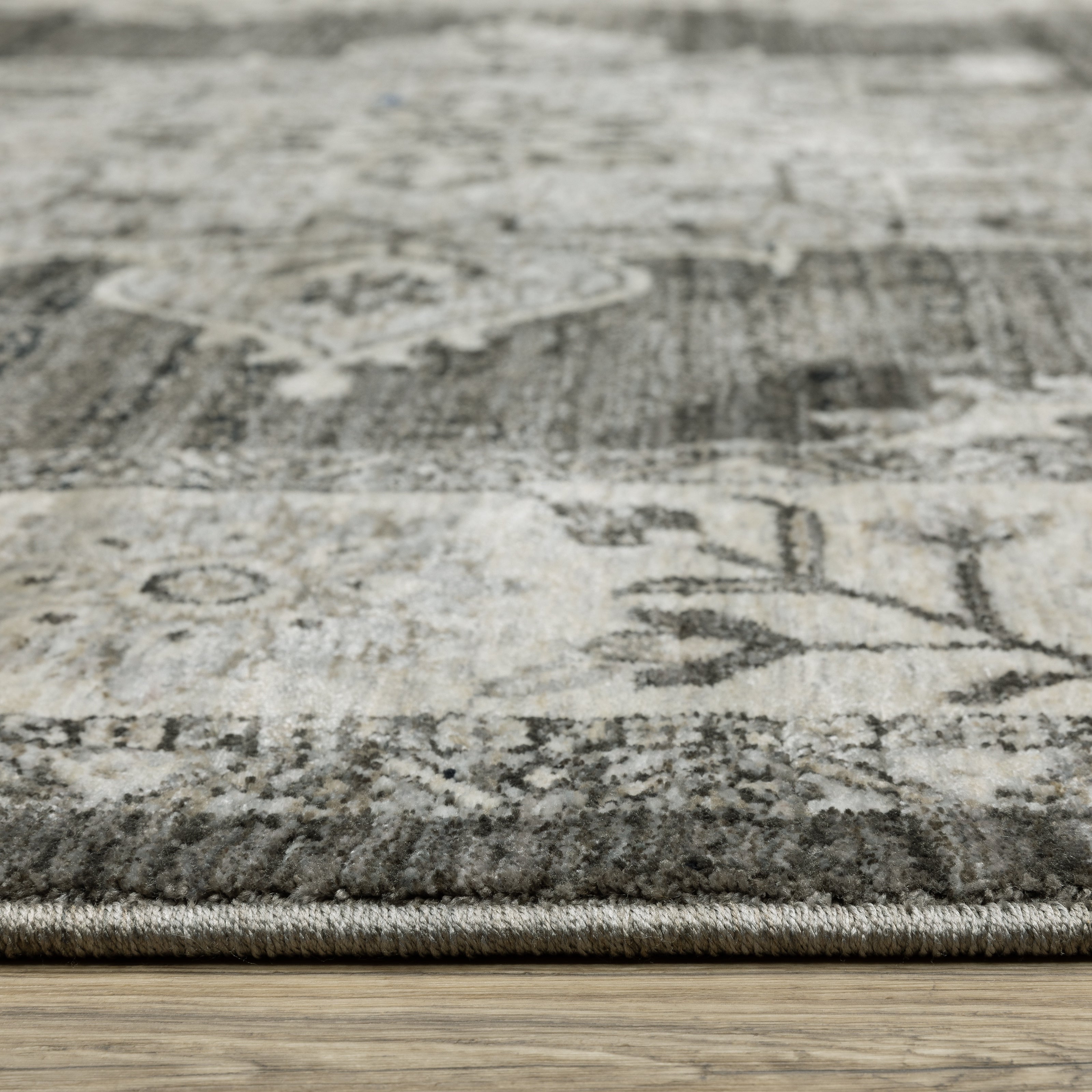 Oriental Weavers Chamberlain CH08B plush traditional rug featuring decorative pattern in grey/ beige tones