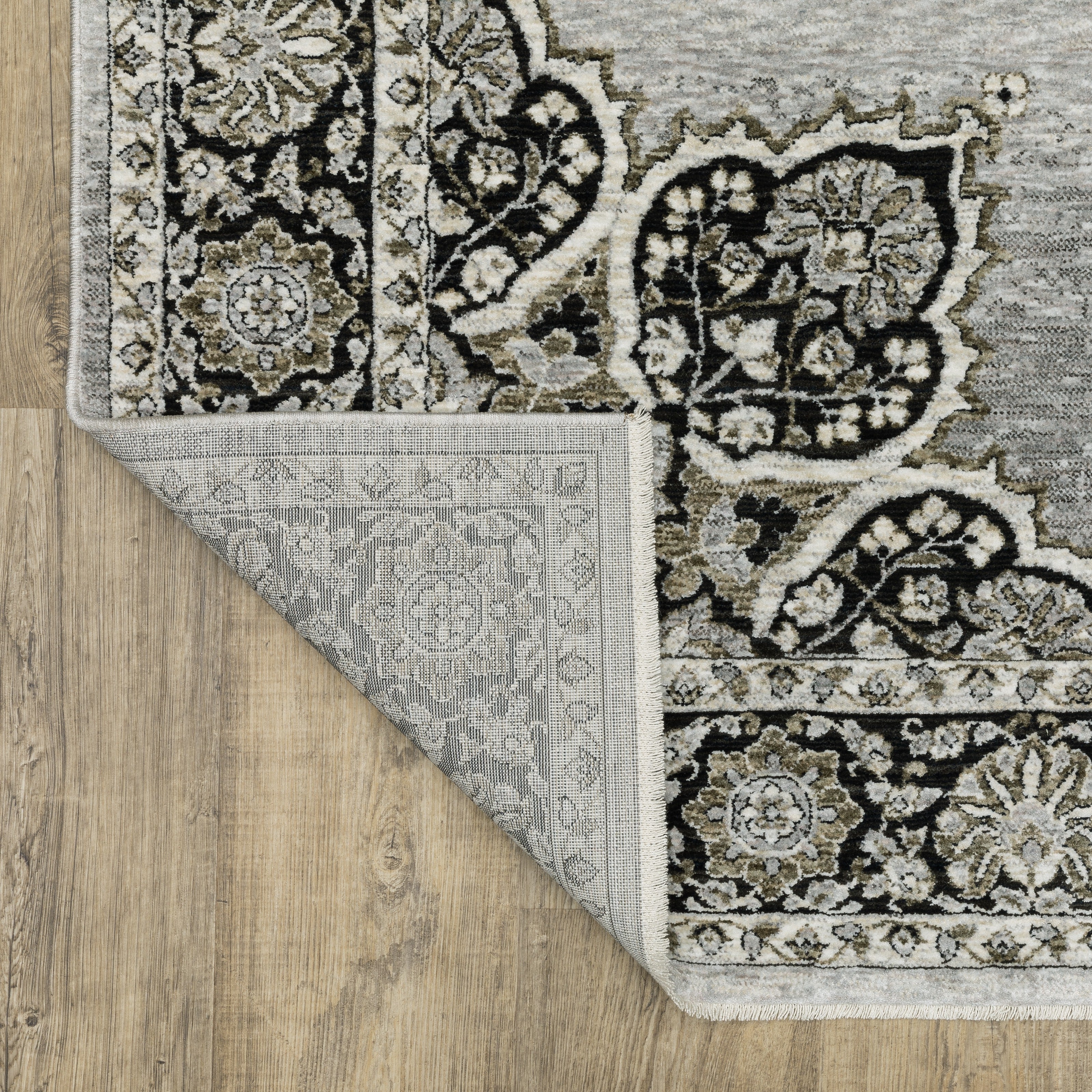 Oriental Weavers Chamberlain CH11L plush traditional rug featuring decorative pattern in grey/ black tones