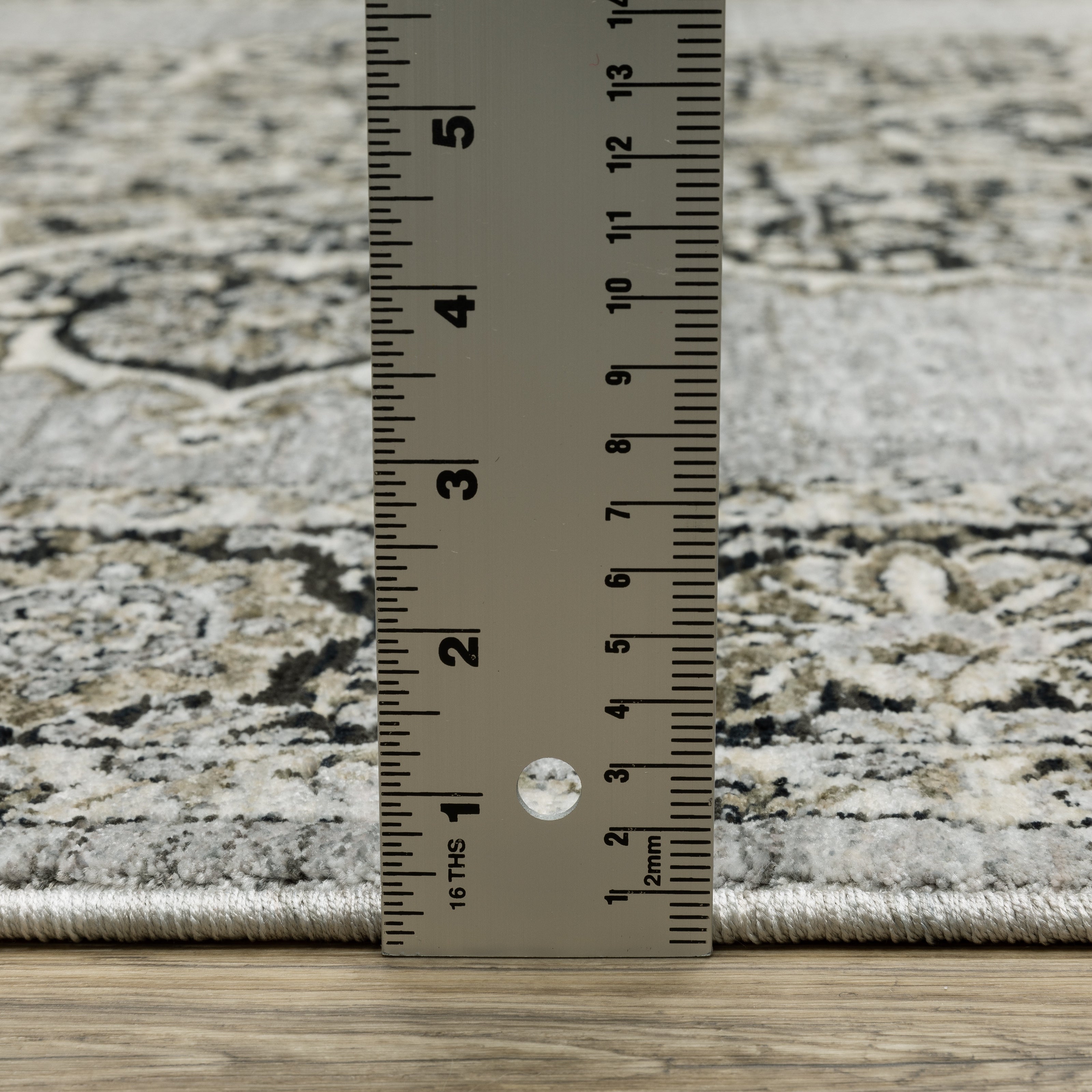 Oriental Weavers Chamberlain CH11L plush traditional rug featuring decorative pattern in grey/ black tones