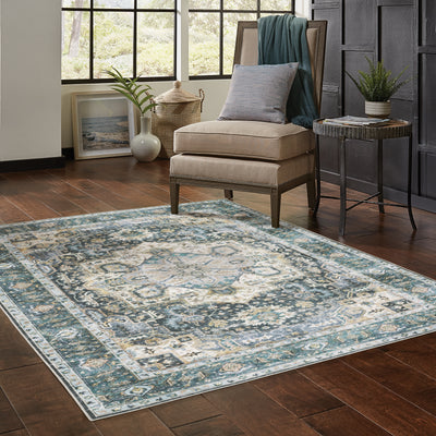 Oriental Weavers Charleston CHA01 traditional rug featuring decorative pattern in blue/ ivory tones