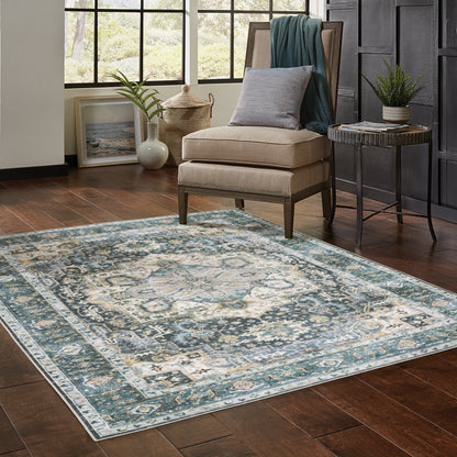 Oriental Weavers Charleston CHA01 traditional rug featuring decorative pattern in blue/ ivory tones