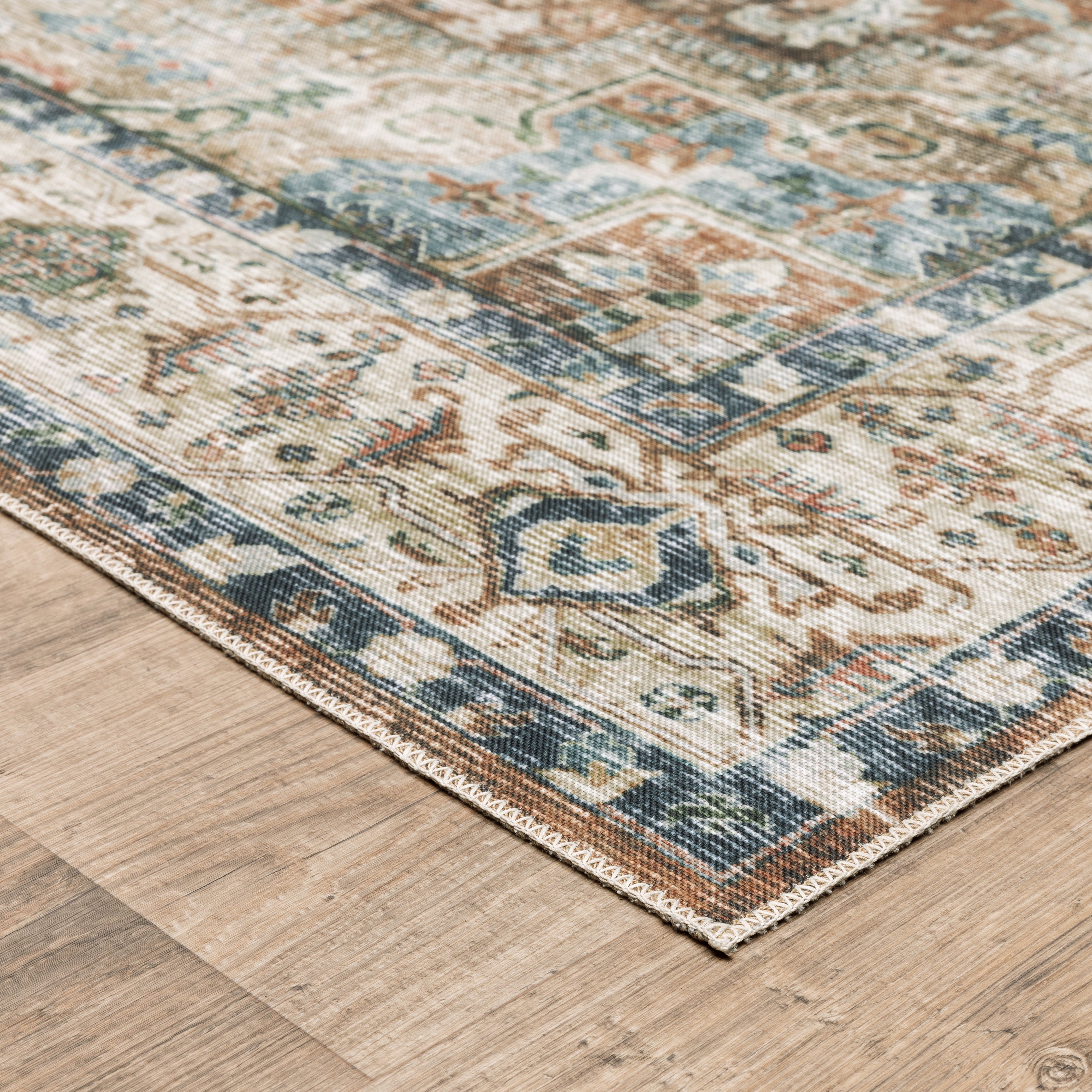 Oriental Weavers Charleston CHA02 traditional rug featuring decorative pattern in blue/ gold tones
