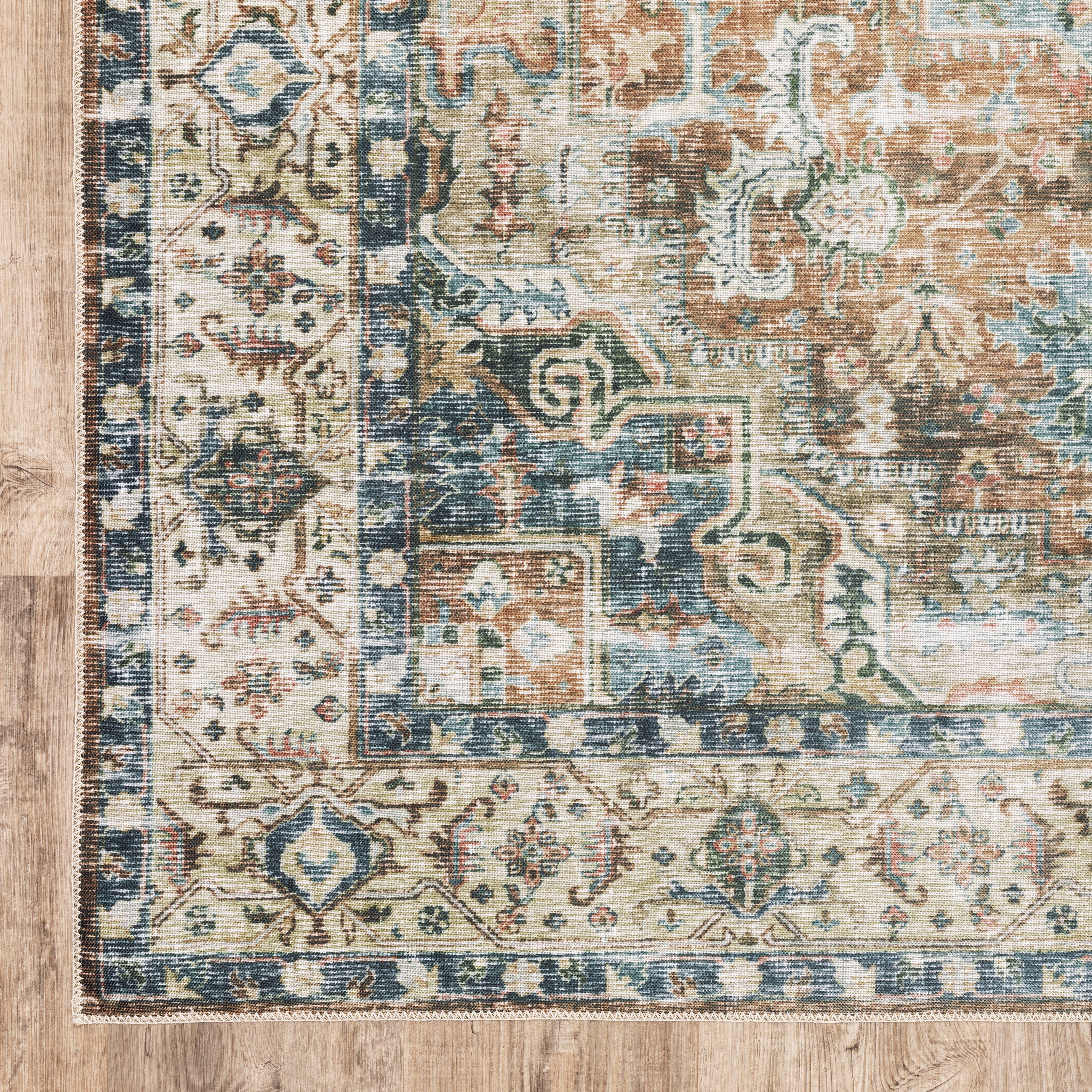 Oriental Weavers Charleston CHA02 traditional rug featuring decorative pattern in blue/ gold tones