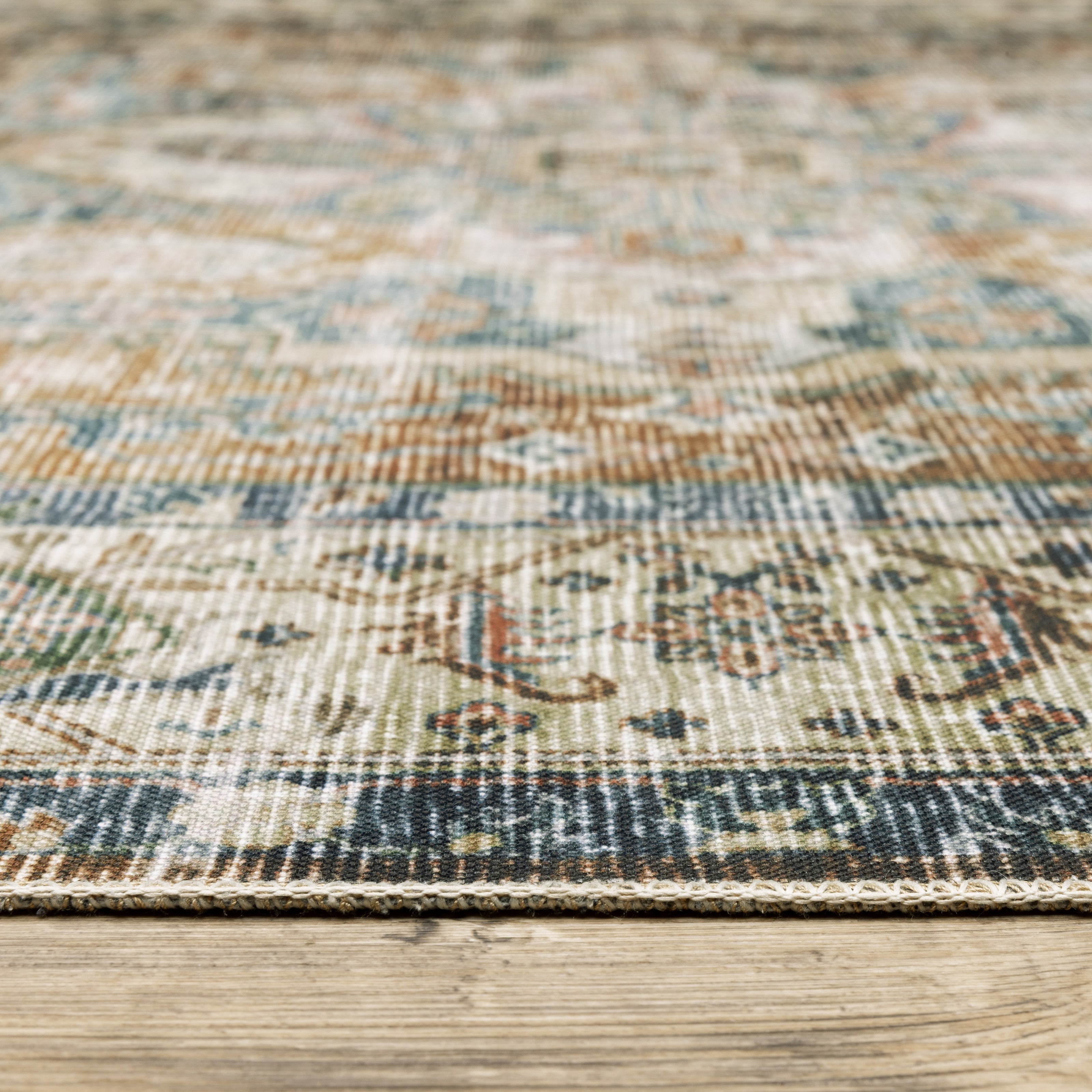 Oriental Weavers Charleston CHA02 traditional rug featuring decorative pattern in blue/ gold tones