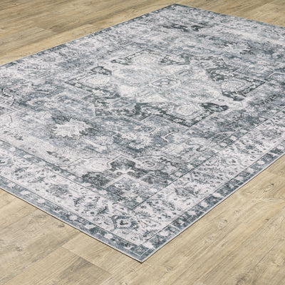 Oriental Weavers Charleston CHA03 traditional rug featuring decorative pattern in navy/ ivory tones
