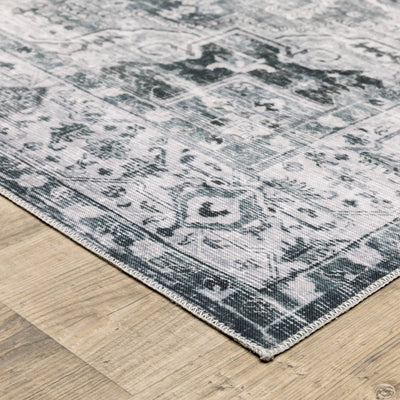 Oriental Weavers Charleston CHA03 traditional rug featuring decorative pattern in navy/ ivory tones