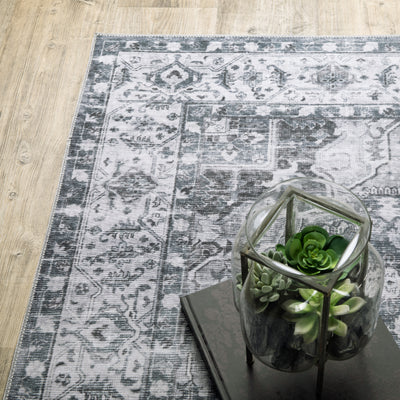 Oriental Weavers Charleston CHA03 traditional rug featuring decorative pattern in navy/ ivory tones