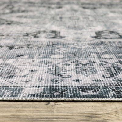 Oriental Weavers Charleston CHA03 traditional rug featuring decorative pattern in navy/ ivory tones