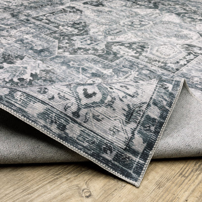 Oriental Weavers Charleston CHA03 traditional rug featuring decorative pattern in navy/ ivory tones