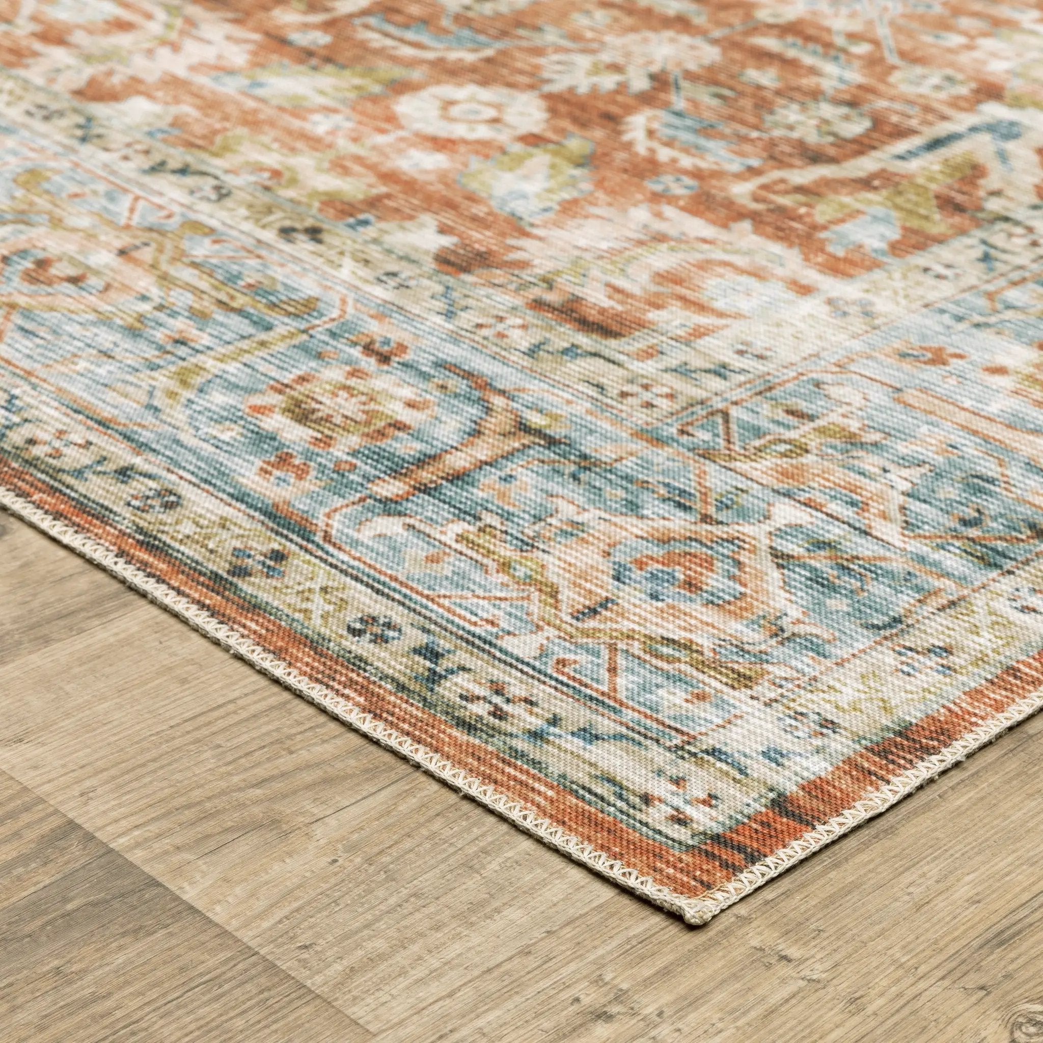Charleston CHA04 Rust/ Blue Area Rug by Oriental Weavers