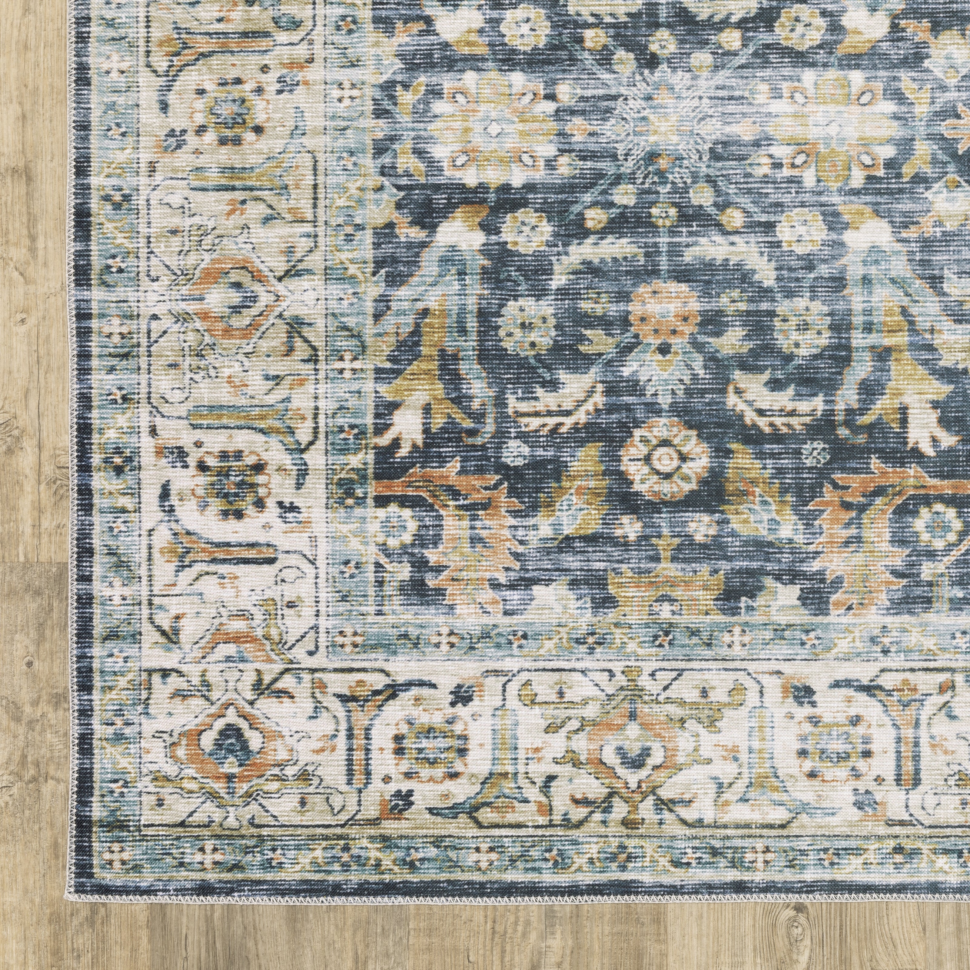 Oriental Weavers Charleston CHA05 traditional rug featuring decorative pattern in blue/ gold tones