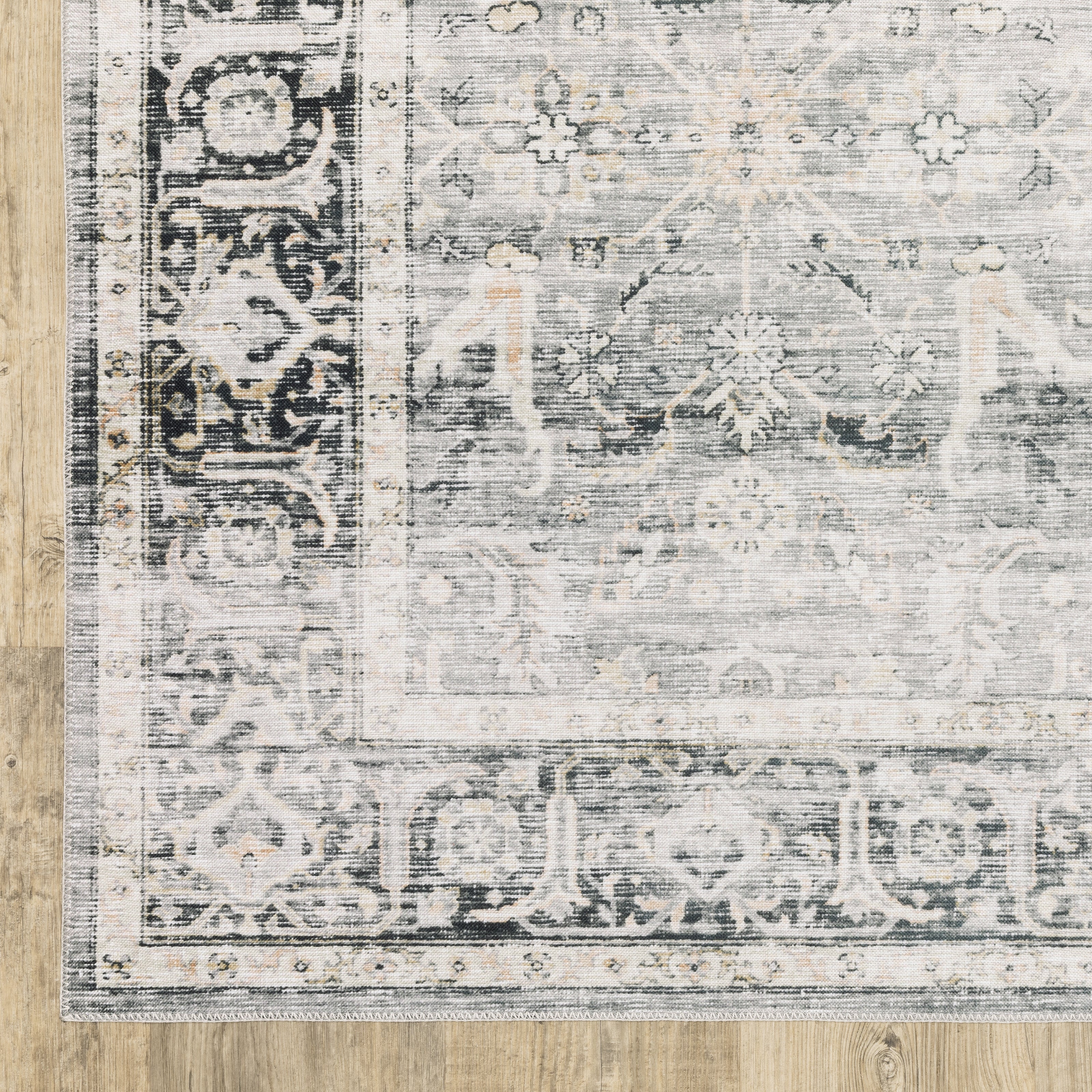 Oriental Weavers Charleston CHA07 traditional rug featuring decorative pattern in charcoal/ grey tones