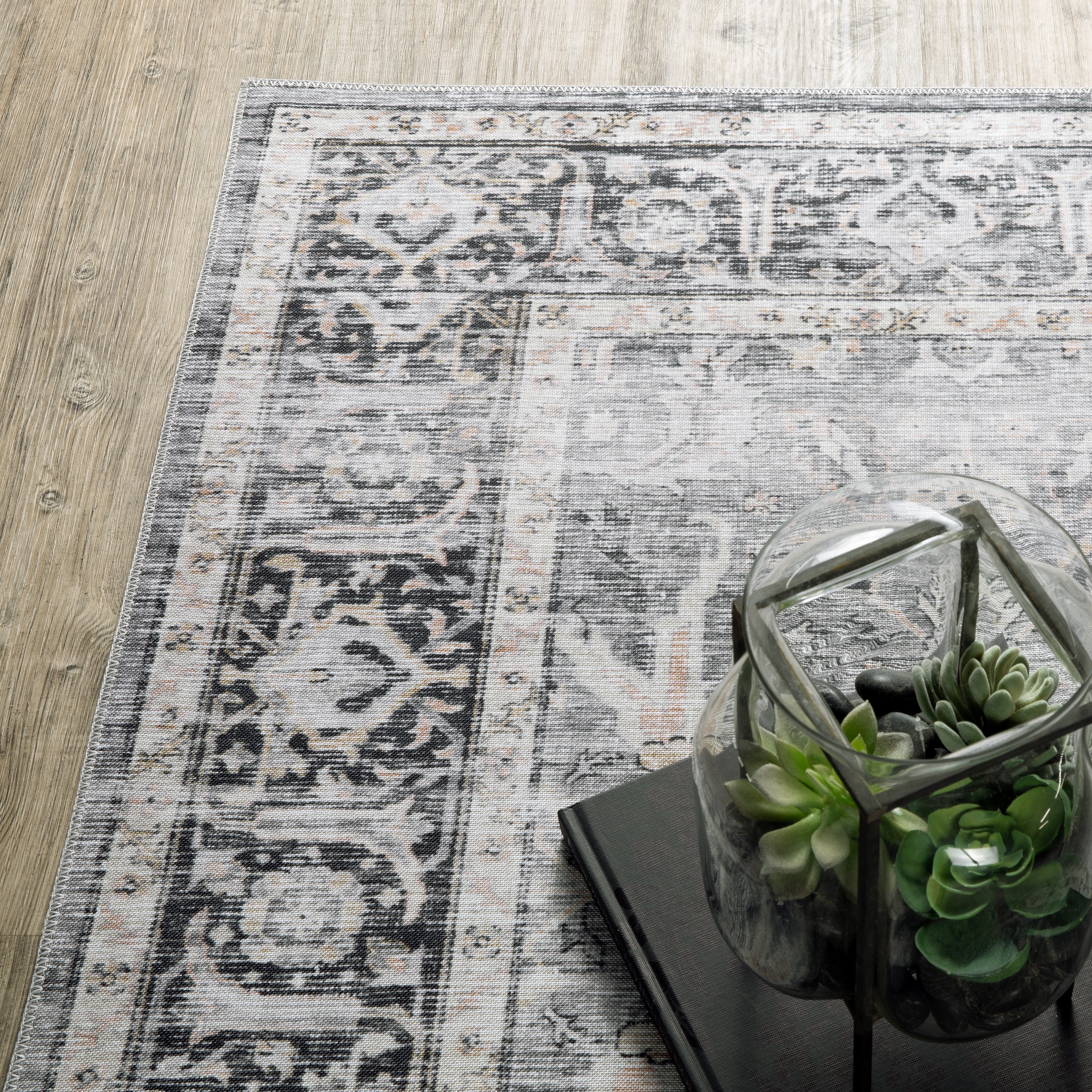 Oriental Weavers Charleston CHA07 traditional rug featuring decorative pattern in charcoal/ grey tones