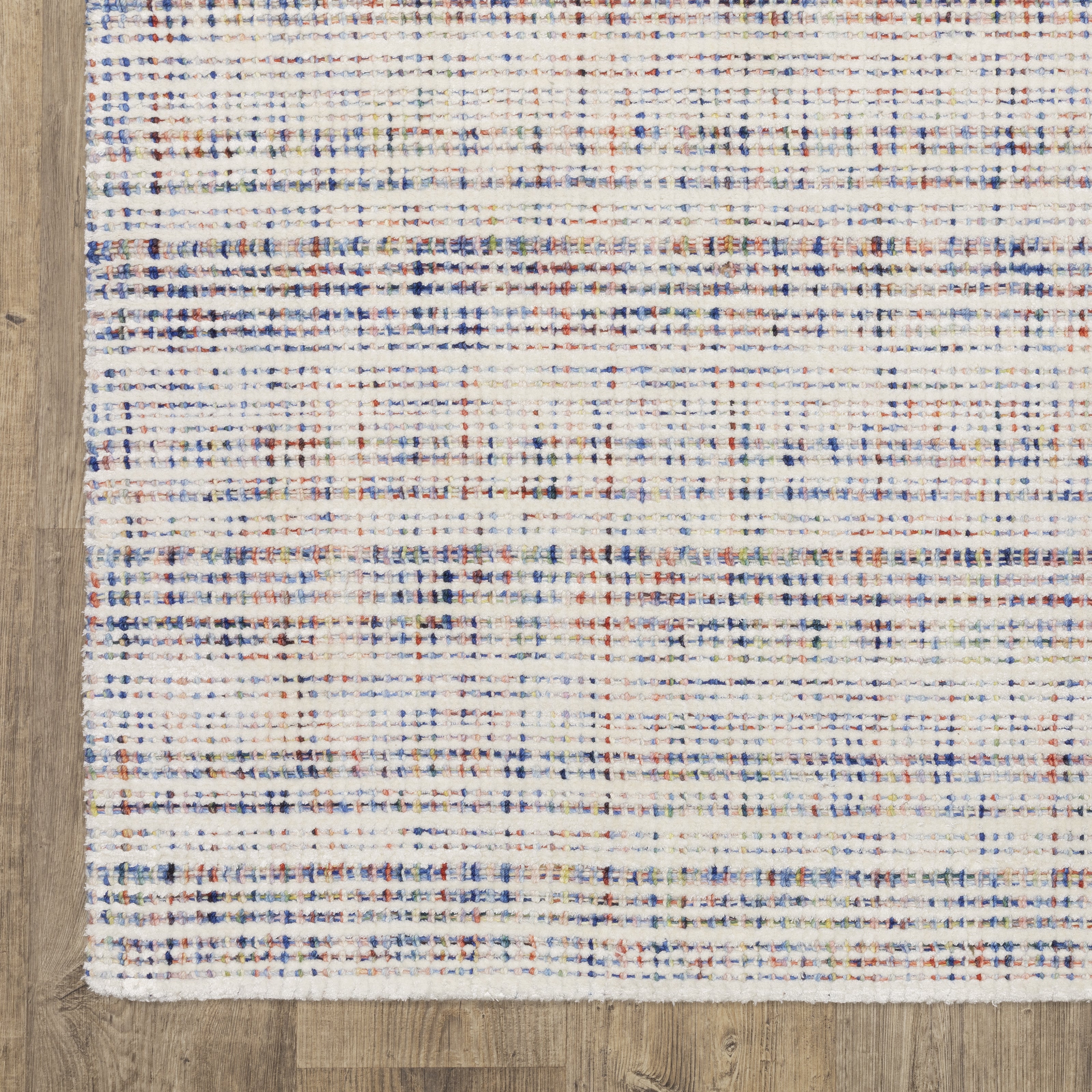 Oriental Weavers Circa CIR01 soft area rug featuring textured design in ivory/ multi tones
