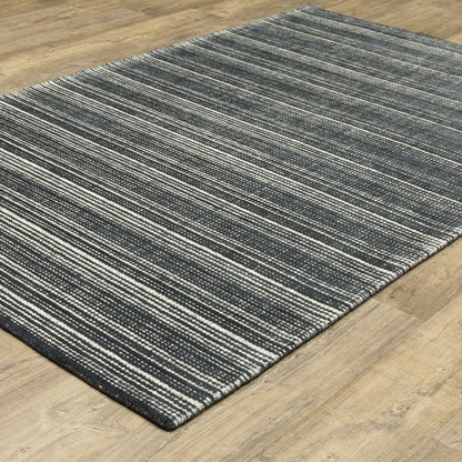 Oriental Weavers Circa CIR02 soft area rug featuring textured design in black/ ivory tones