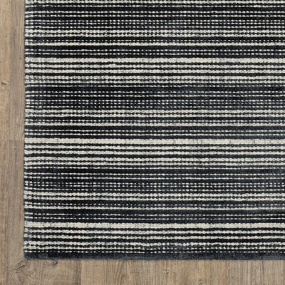 Oriental Weavers Circa CIR02 soft area rug featuring textured design in black/ ivory tones