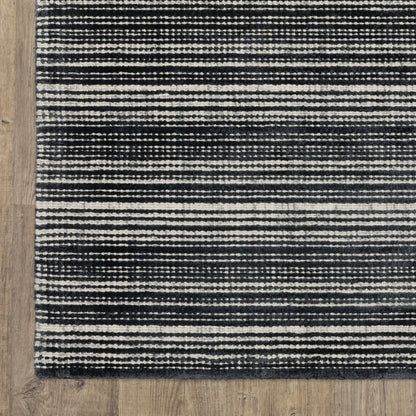 Oriental Weavers Circa CIR02 soft area rug featuring textured design in black/ ivory tones