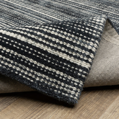 Oriental Weavers Circa CIR02 soft area rug featuring textured design in black/ ivory tones