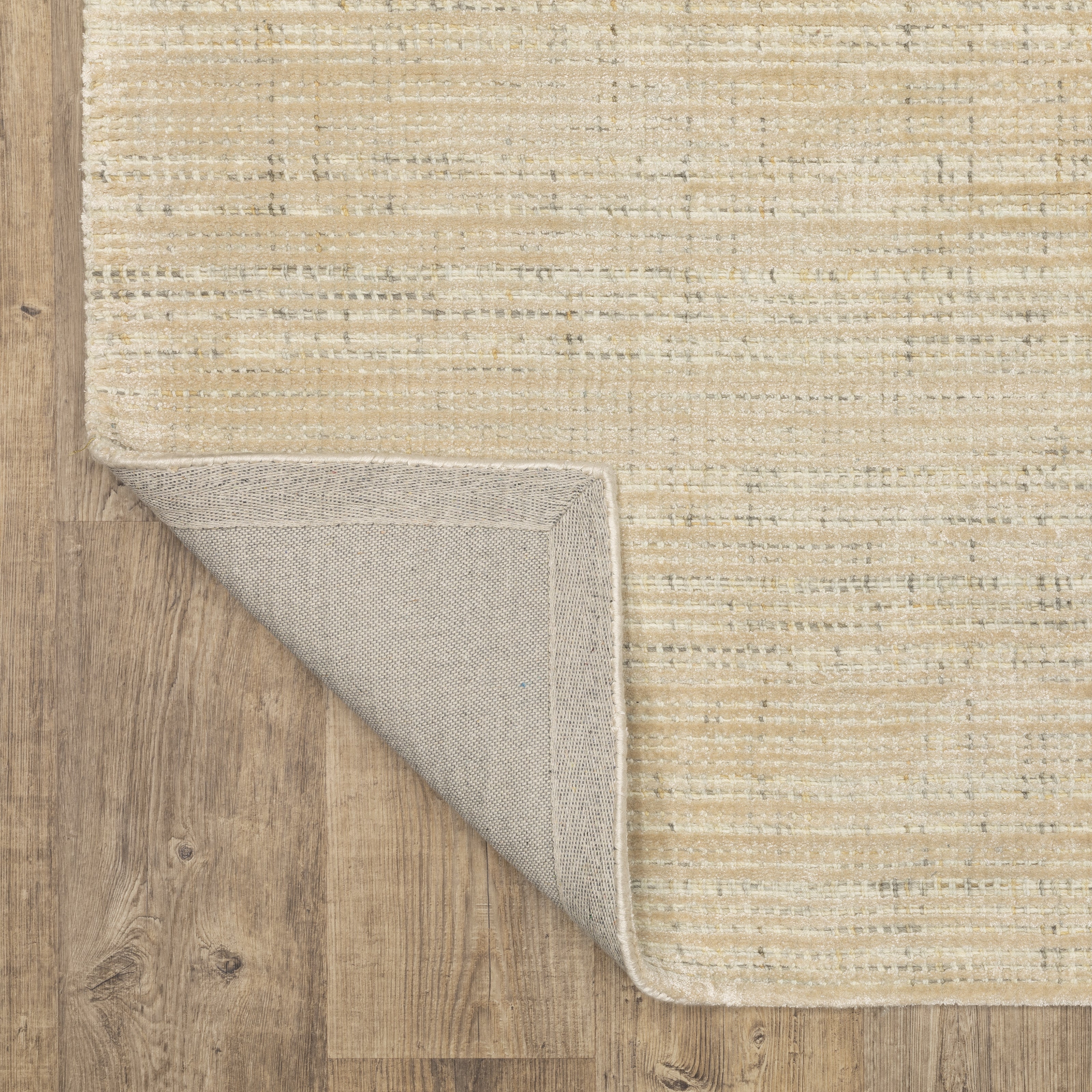 Oriental Weavers Circa CIR03 soft area rug featuring textured design in beige/ ivory tones