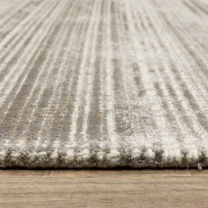 Oriental Weavers Circa CIR04 soft area rug featuring textured design in grey/ ivory tones