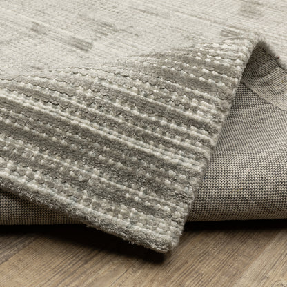 Oriental Weavers Circa CIR04 soft area rug featuring textured design in grey/ ivory tones
