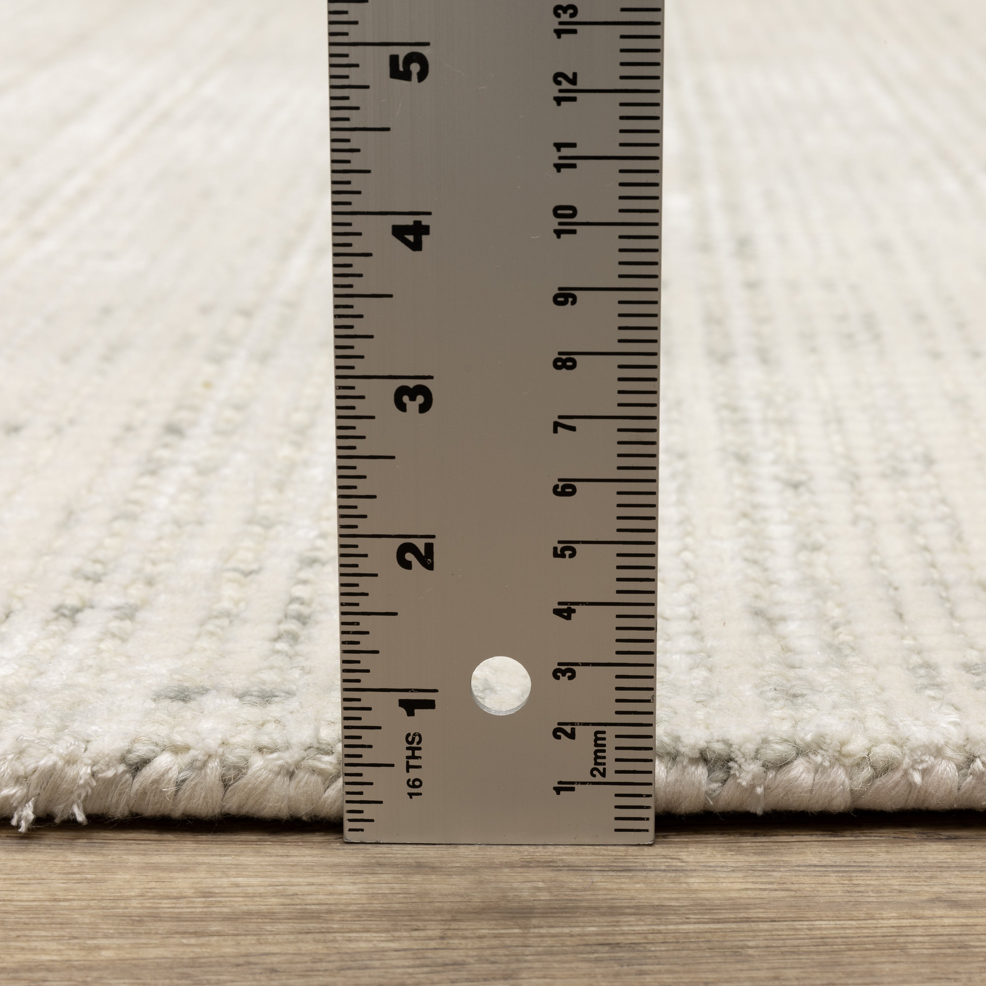 Oriental Weavers Circa CIR08 soft modern rug featuring textured design in ivory/ grey tones