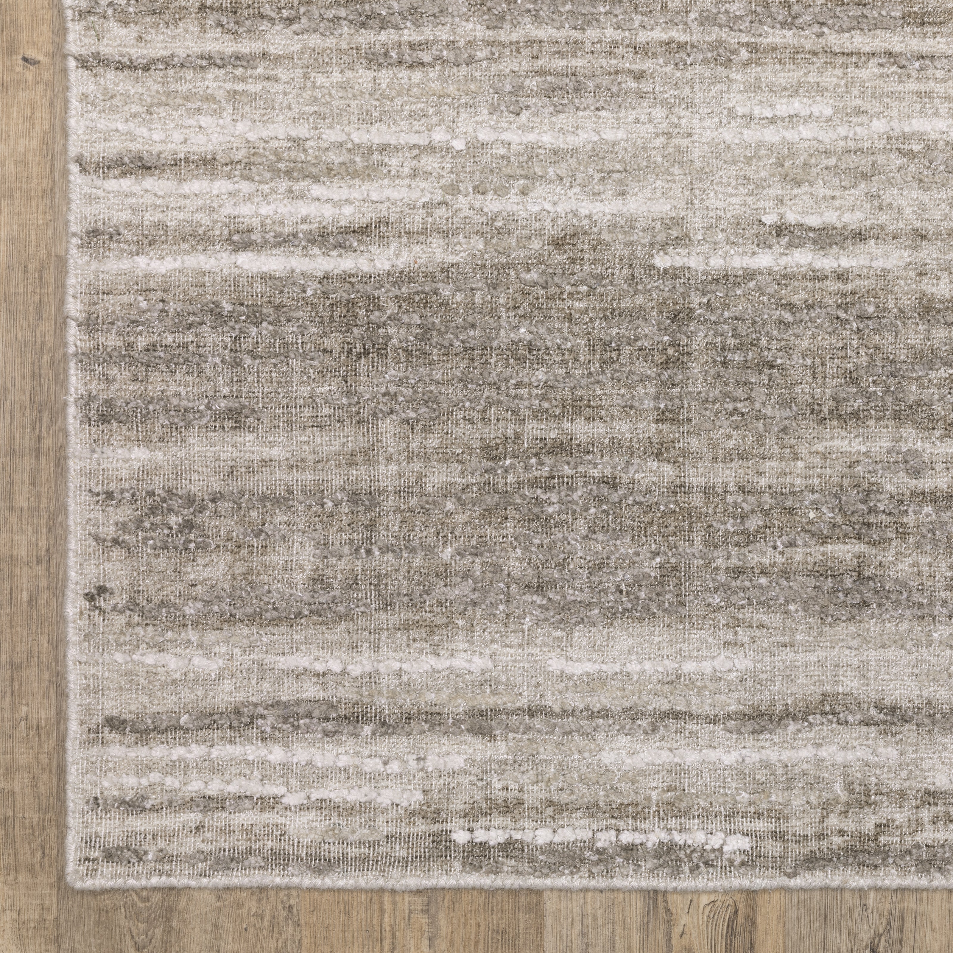 Oriental Weavers Clarke CLA01 soft modern rug featuring abstract pattern in beige/ brown tones