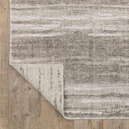Oriental Weavers Clarke CLA01 soft modern rug featuring abstract pattern in beige/ brown tones