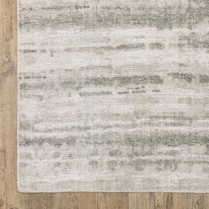 Oriental Weavers Clarke CLA02 soft modern rug featuring abstract pattern in beige/ green tones