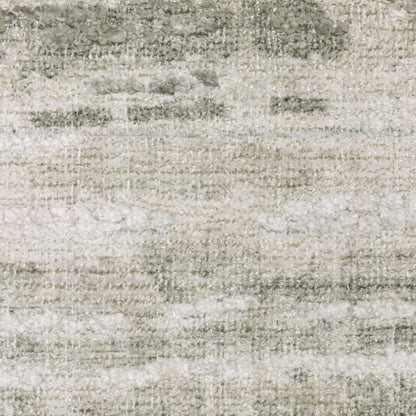 Oriental Weavers Clarke CLA02 soft modern rug featuring abstract pattern in beige/ green tones