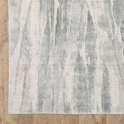 Oriental Weavers Clarke CLA03 soft modern rug featuring abstract pattern in green/ ivory tones
