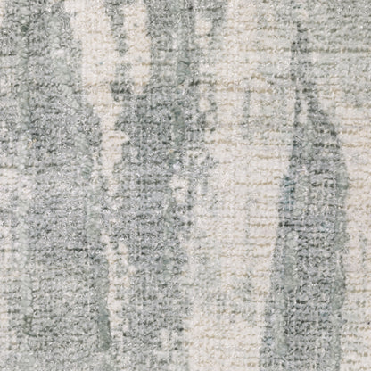Oriental Weavers Clarke CLA03 soft modern rug featuring abstract pattern in green/ ivory tones