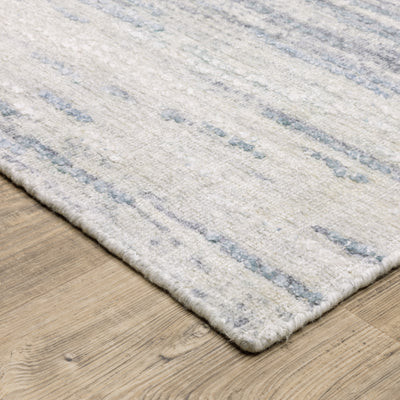 Oriental Weavers Clarke CLA04 soft modern rug featuring abstract pattern in ivory/ blue tones