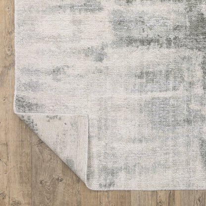 Oriental Weavers Clarke CLA05 soft modern rug featuring abstract pattern in beige/ grey tones
