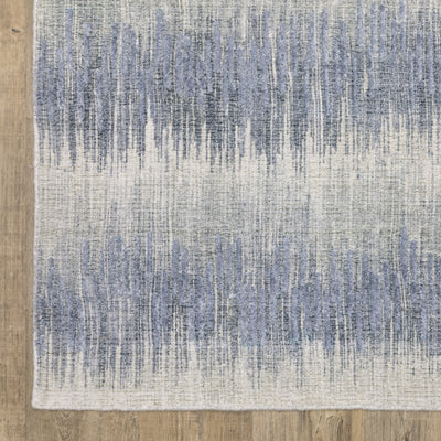 Oriental Weavers Clarke CLA06 soft modern rug featuring abstract pattern in blue/ ivory tones