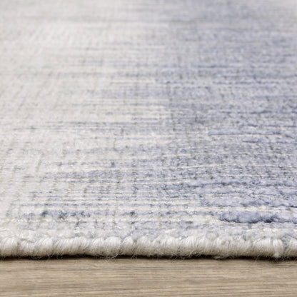 Oriental Weavers Clarke CLA06 soft modern rug featuring abstract pattern in blue/ ivory tones